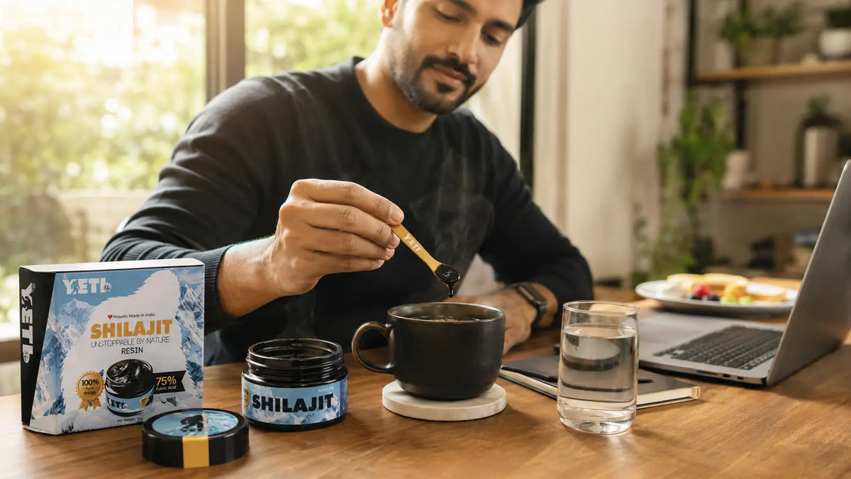 Shilajit resin beside a cup of coffee as part of a morning energy routine